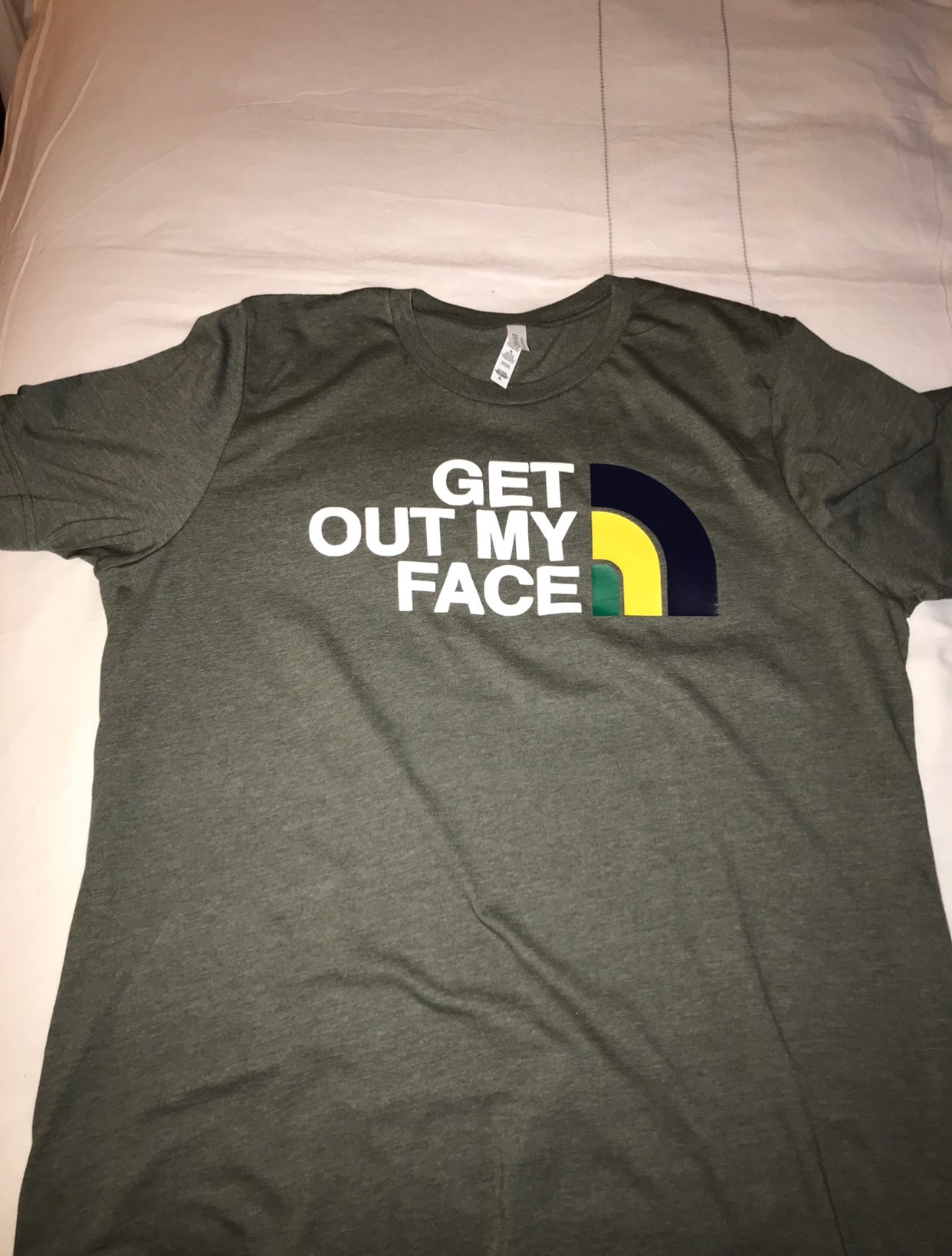 “Get out my face” tee